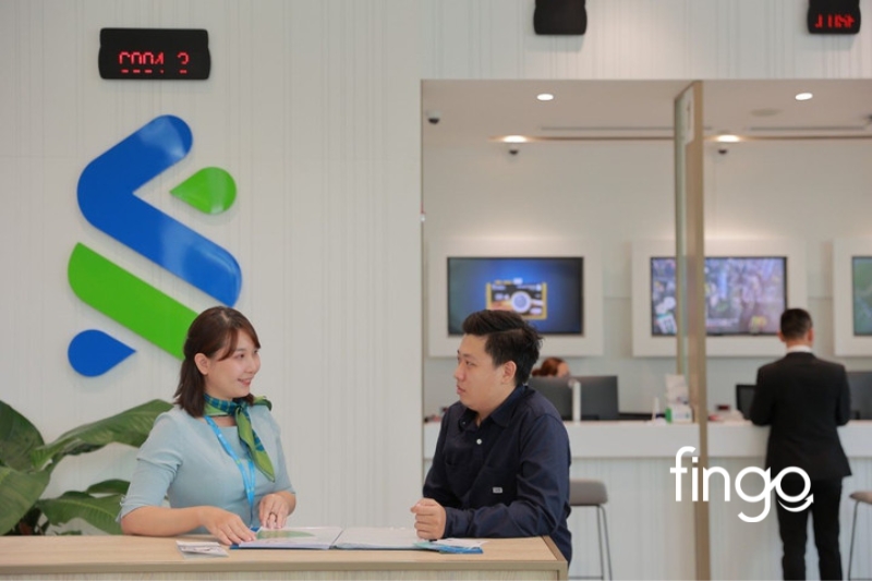 Cách chuyển phí chuyển đổi ngoại tệ Standard Chartered