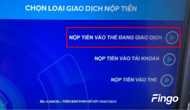 Chọn "Nộp tiền vào thẻ đang giao dịch"